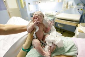 A newborn baby may have suffered a birth injury.