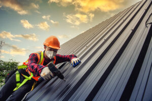 A construction worker is working at height.