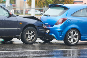 Two cars have had a rear end collision.