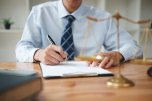 A lawyer works on a split liabilty claim.